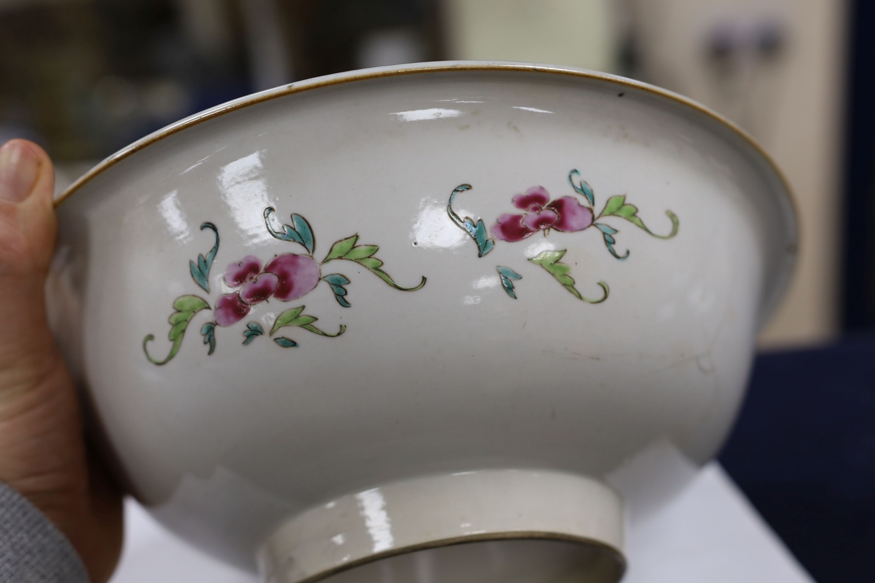 A Chinese underglaze blue and famille rose decorated basin or bowl, Qianlong period, 27 cm diameter